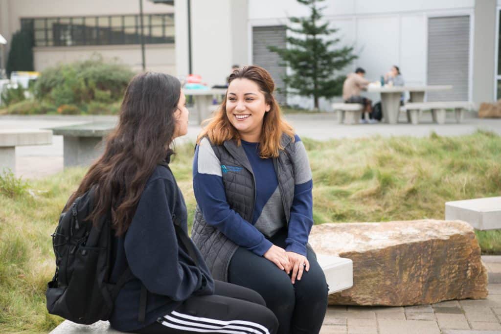 College college with student talking together outside