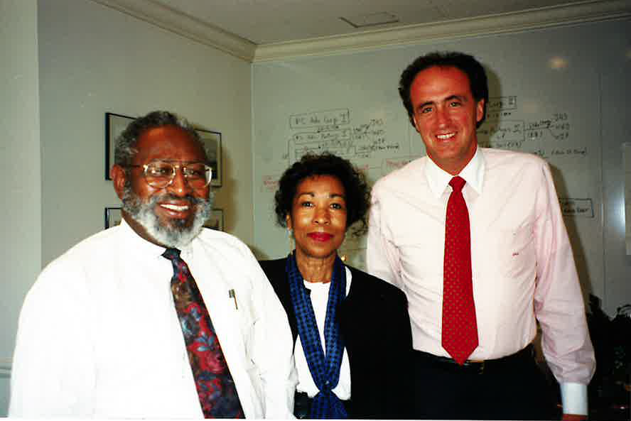 Picture of the late Reverend Eugene Farlough, Shirley Millender-Williams, and John H. Scully together