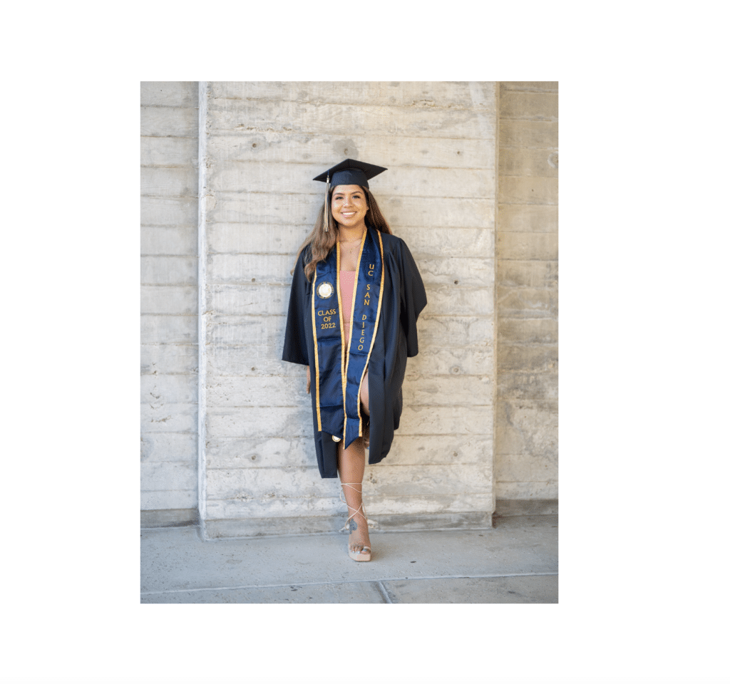 Photo of Allison Cubillas in UC San Diego graduation cap and gown with white border around photo