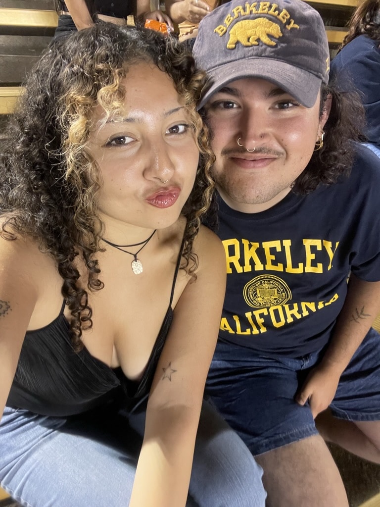 Ale taking selfie with friend at UC Berkeley football game
