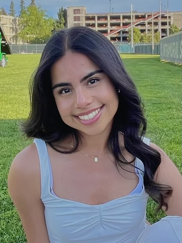 Ashley Ramirez smiling with grass in background